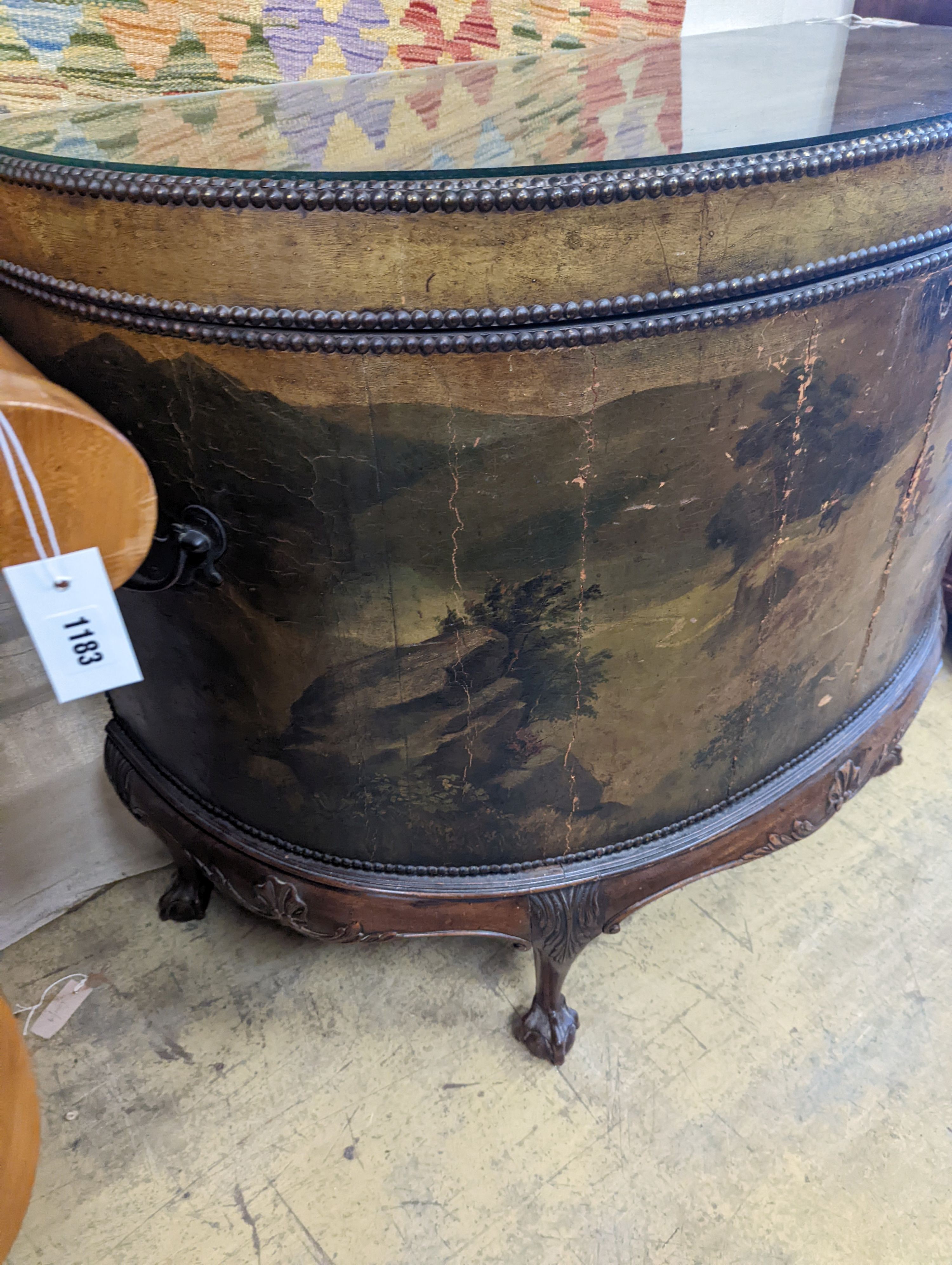 An early 20th century leather covered mahogany D shaped hinged top coffer painted with hunting scenes, length 114cm, depth 53cm, height 91cm